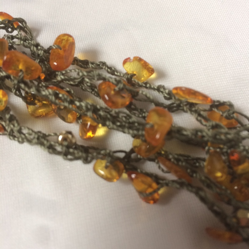 amber crocheted necklace close up